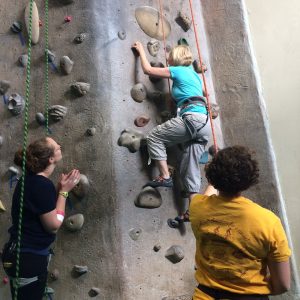 Ann trying out the climbing
