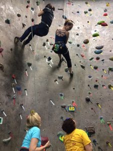 Jin and Kim walking down the wall